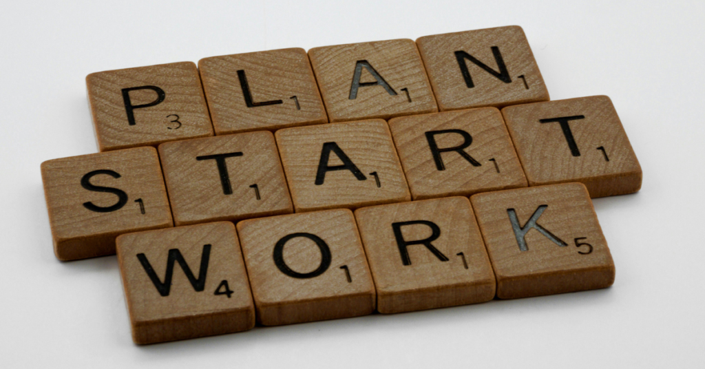 Entrepreneur analyzing new startup niches and revenue planning charts