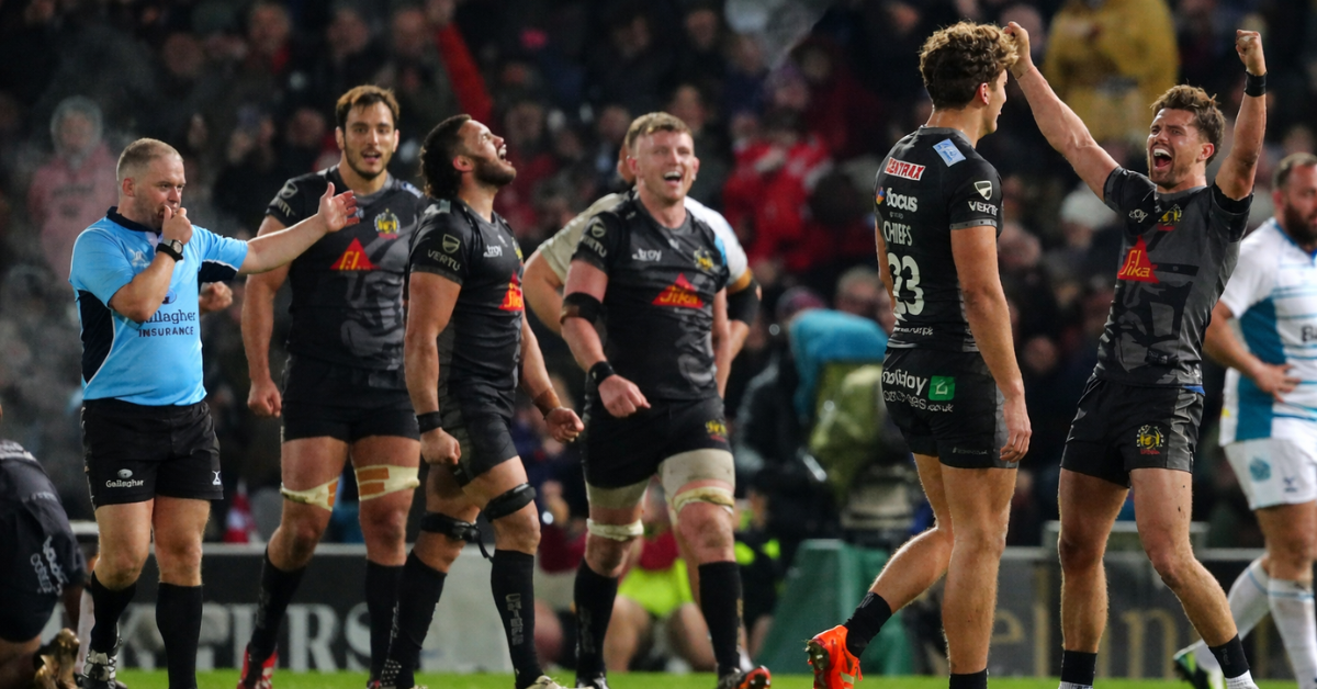 Esher Rugby Club players executing a tackle during a competitive match